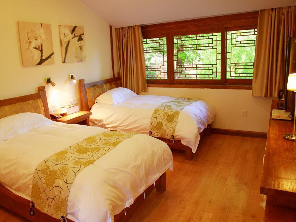 Lijiang Merry Inn מראה חיצוני תמונה